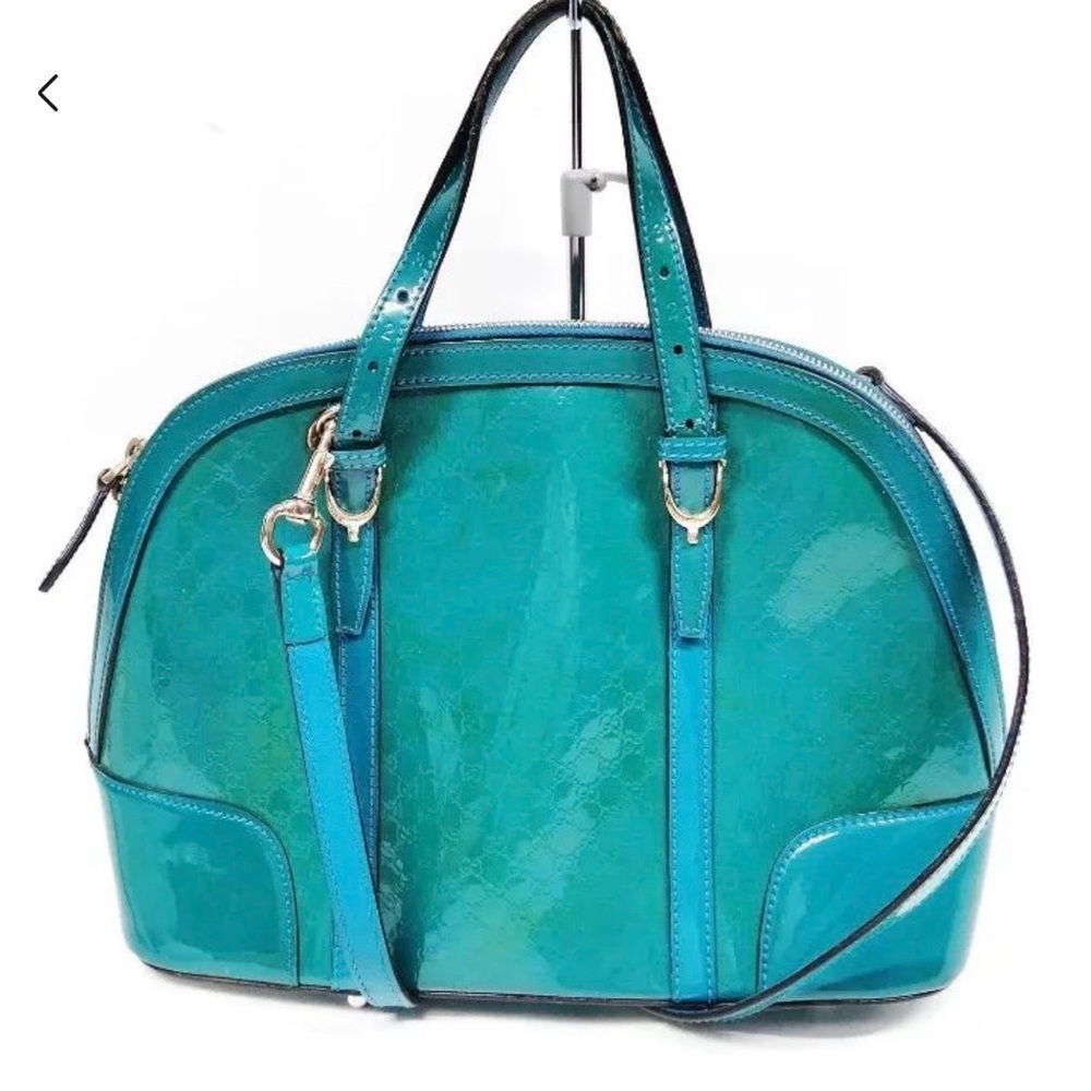 Stunning rare teal Gucci! With COA